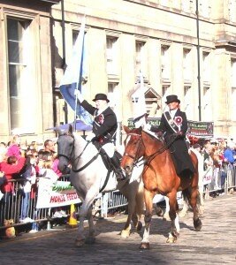 Riding of the Marches: Captain and Lass with the Blue Blanket. 